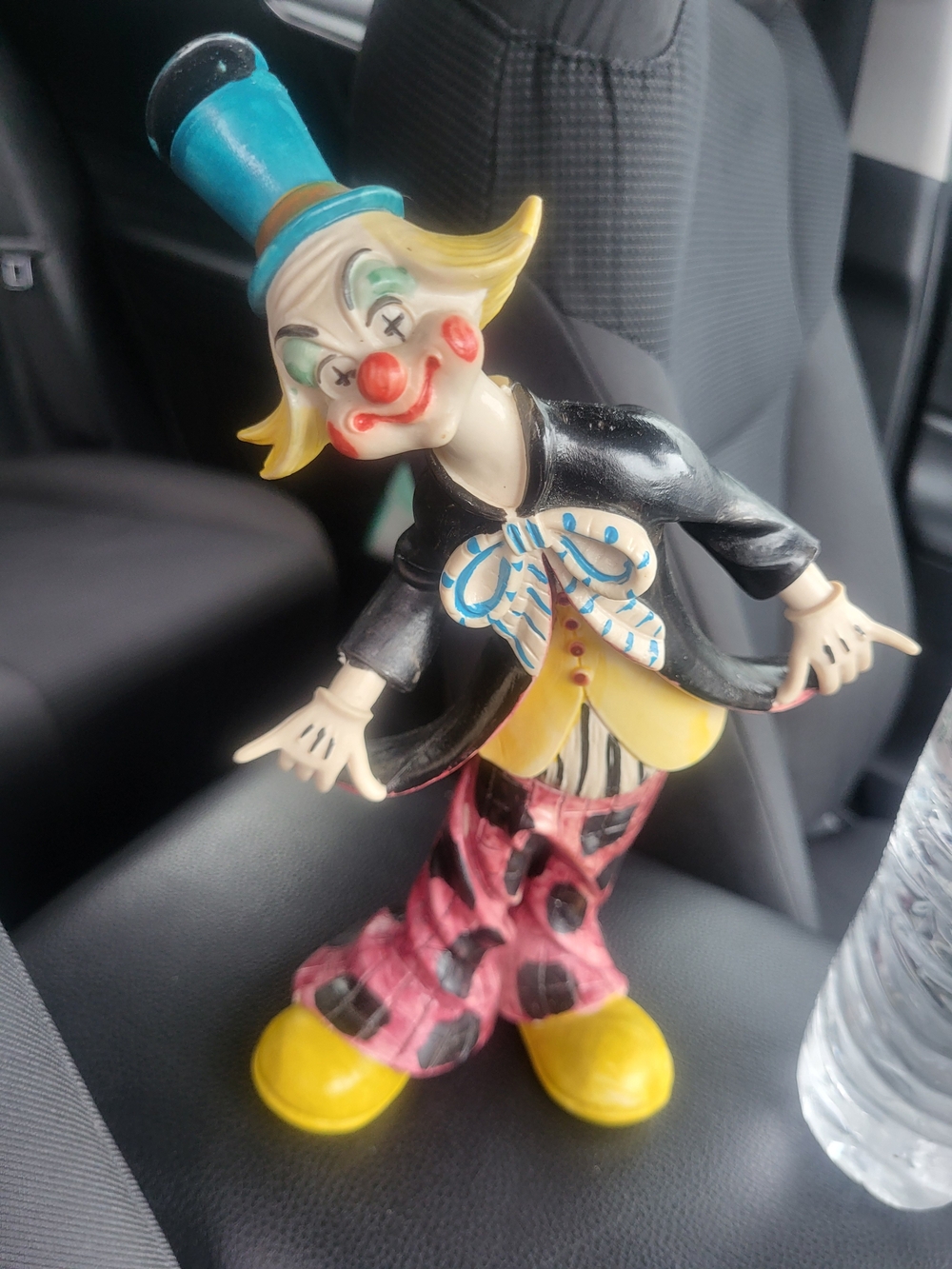 Whimsical Ceramic Clown Figurine in Bright Colors